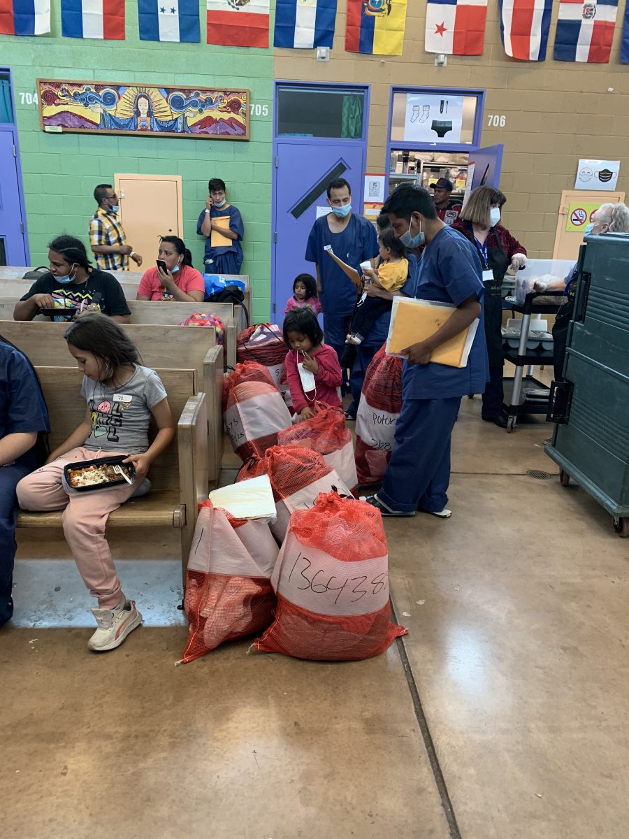 Guests arriving at Casa Alitas. Adults and children and onion sacks of possessions.