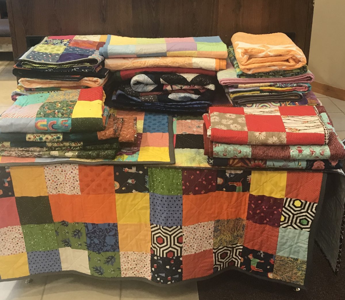 colorful quilts on display